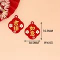 Macro detail view of red alloy auspicious charms showing 35.5mm by 30.5mm dimensions - Auspicious and Wishful Style (3# Red) / Red