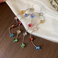 Detailed view of colorful faceted glass bead long tassel earrings on white silk fabric - Earrings Only / 925 Silver Needle / Silver - Rainbow