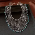 Close-up detail of vintage-style fringe necklace with light blue crystal beads - Silver-Blue