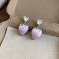 Close-up of sweet strawberry drop earrings with heart crystal studs on rustic background. - Heart Strawberry Style (HE32060)