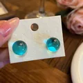 Elegant minimalist round resin stud earrings in translucent turquoise blue finish - Round Style (HE33609-) / Blue