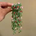 Detail of handmade green beaded floral drop earrings featuring pink flowers and leaves - Style 20 (Silver Pin) / Red Pink Green