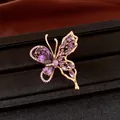 Detailed view of elegant butterfly earring featuring purple zircons and 18K gold plating finish - Ring / Gold-Purple