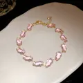 Elegant close-up view of a pink water-drop zircon bracelet with a gold-tone finish - Gold-Pink