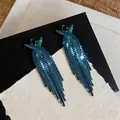 Orecchini a nappa in argento S925 con strass blu e design a croce a X elegante - Canna di Fucile-Verde