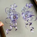 Elegant purple chiffon flower hair clip with long satin ribbon tassels for Hanfu styling. - Duckbill Clip (1 Pair) / Purple