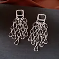 Detail of vintage chandelier earrings featuring black teardrop stones and rhinestones - Water Drop Tassel Style / Black