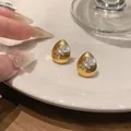 Boucles d'oreilles en goutte plaquées or 18k avec un motif fleur de zircon en étoile - Or