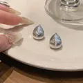 Boucles d'oreilles gouttes argentées avec étoile en zircon et texture nervurée (84) - Argent