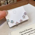 Close-up of sparkling zircon star stud earrings in various colors on a display card - Colored Star Rhinestone Style (3#) / 6 Pcs Set / Multicolor