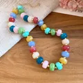 Colorful handmade beaded necklace with vibrant geometric stones and golden accents. - Geometric Beaded Style / Gold-Multicolor