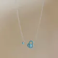 Elegant 18k gold plated necklace with turquoise gourd pendant and side bead detail - Gourd Wulu Style / Necklace - Silver - Blue