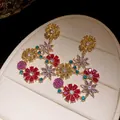 Detailed view of vintage-style floral drop earrings with vibrant multi-colored zircons - Floral Long Dangle Earrings / 925 Silver Needle / Gold