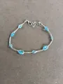 Bracelet élégant en maille d'argent avec pierres ovales bleu ciel et pendentif en zircon rose - Bracelet / Argent-Bleu