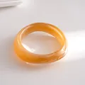 Bracelet jonc géométrique irrégulier en acrylique avec un fini marbré orange chaleureux - Khaki