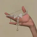 Macro detail of elegant beaded choker with a shimmering rhinestone bow and pearl drops - Bowknot Pearl Choker (14#)