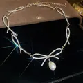 Elegant silver bow-shaped stainless steel choker necklace featuring a teardrop pearl - Bowknot Pearl Pendant Style (36#)