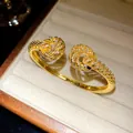 Close-up of 18K gold plated twisted cuff bangle with sparkling cubic zirconia - Twisted Pattern (HB6062) / Gold