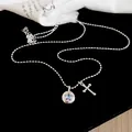 Detail view of silver-tone bead chain necklace with star pendant and cross charm - Round Star Cross Style / AB Color