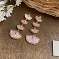 Detailed close-up of 18k gold plated pink zircon fan-shaped tiered drop earrings - Silver Post Style (Real Gold Plated) / Pink