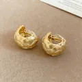 Elegant 18k gold plated C-shaped woven clip-on earrings for women with no piercings - Clip-On Earrings / Gold