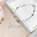 Double-layered Korean style necklace with zircon star pendant, blue beads and pearls - Double Layer Star Necklace / Silver