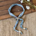 Detail of light blue fabric necklace featuring a starfish pendant and shell motifs. - Blue Silver Starfish (Necklace 6#)
