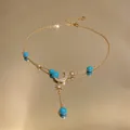 Detailansicht der 18K vergoldeten Halskette mit Mond Stern Anhängern und blauen Perlen - 5# Halskette
