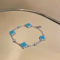 Silver-plated bracelet with turquoise clover charms and sparkling cubic zirconia details - 4# Bracelet / Silver-Blue