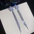 Elegant silver needle flower earrings featuring long sparkling zircon tassels for women. - 5# (HE31465)