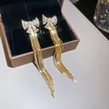 Elegant gold bowknot earrings with long zircon tassels for high-end styling - 6# (HE31465)