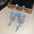 Elegant silver-toned leaf tassel earrings featuring sparkling marquise-cut cubic zirconia - 15# (HE31465)