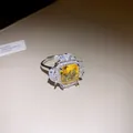 Detail view of a luxury silver open ring featuring a radiant square yellow zircon gemstone. - Open Ring / Silver (Yellow Main Stone)