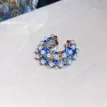 Close-up detail of C-shaped ear cuff with multi-color rhinestones and pearls - Clip-On Earring (HE34181) / Silver Multicolor (Single Piece)