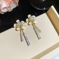 Elegant gold floral earrings featuring crystal tassels and sparkling zircon inlay details - 31# (HE31465)