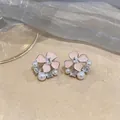 Detailed close-up of pink enamel floral earrings with pearls and zirconia - Flower Style (HE33476) / Pink