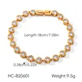 Detail shot of a gold stainless steel bracelet with cubic zirconia inlays and dimensions. - Round Zircon Style