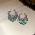 Detailed view of bohemian hoop earrings with purple and green zircon teardrop charms - Hoop Style / Silver-Purple-Green
