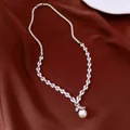Elegant silver-tone necklace featuring marquise zircon stones and a single pearl pendant - Necklace / Silver-White