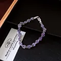 Detailed view of an elegant silver bracelet featuring marquise-cut purple zircons - Bracelet / Silver-Purple