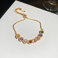 French vintage gold plated bracelet with square multicolor cubic zirconia stones - Iridescent Square Style