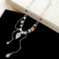 Elegant French style layered necklace with colorful beads and silver leaf pendant - Silver-Green