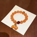 Elegante bracciale di pietre occhio di gatto arancione Maillard con dettagli dorati - Stile 6 (HB5488)