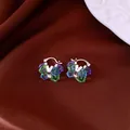 Detailed view of vintage colorful square crystal hoop earrings on elegant brown silk background - Blue-Green-Purple Style