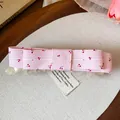 Close-up of pink striped bow hair clip with cute cherry pattern detail - Twist Clip / Single Piece / Pink (Cherry Print)