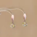 Handmade pink enamel bean studs featuring clear glass ball drops with colorful polka dots - Drip Oil Style