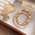 Elegant gold floral cuff bangle and pink beaded bracelet set for women vintage style jewelry - 3D Embossed Floral Bracelet Set / Gold-Pink