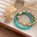 Vintage gold flower cuff bracelet and turquoise beaded bracelet set for women - Bright Gold Flower Open Bangle / Gold-Blue