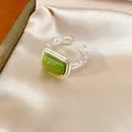 Close-up of a stylish green rectangular resin stone on a silver-tone chain link open ring - Square Open Ring / Silver-Green