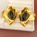 Elegant vintage hammered gold geometric stud earrings with black oval resin center - Irregular Geometric Style / Gold with Black